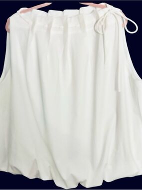 NWT!DAVI & DANI PLUS SIZE SLEEVELESS W/ A HAND TIE ON SIDE W/ BUBBLE HEM. SZ 3X.